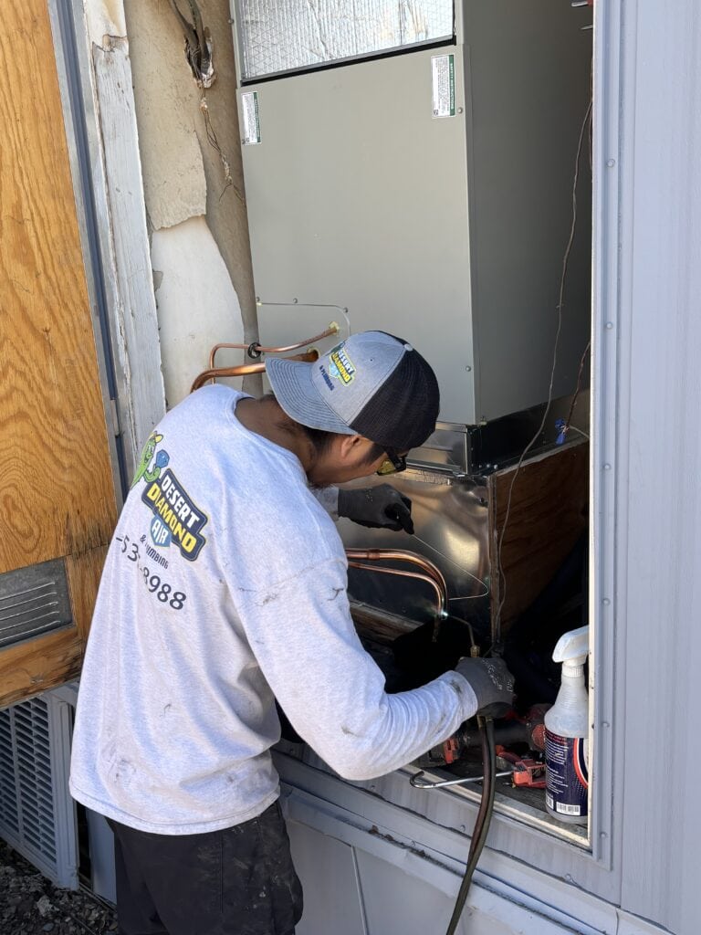Desert Diamond working on an HVAC system they installed in Phoenix